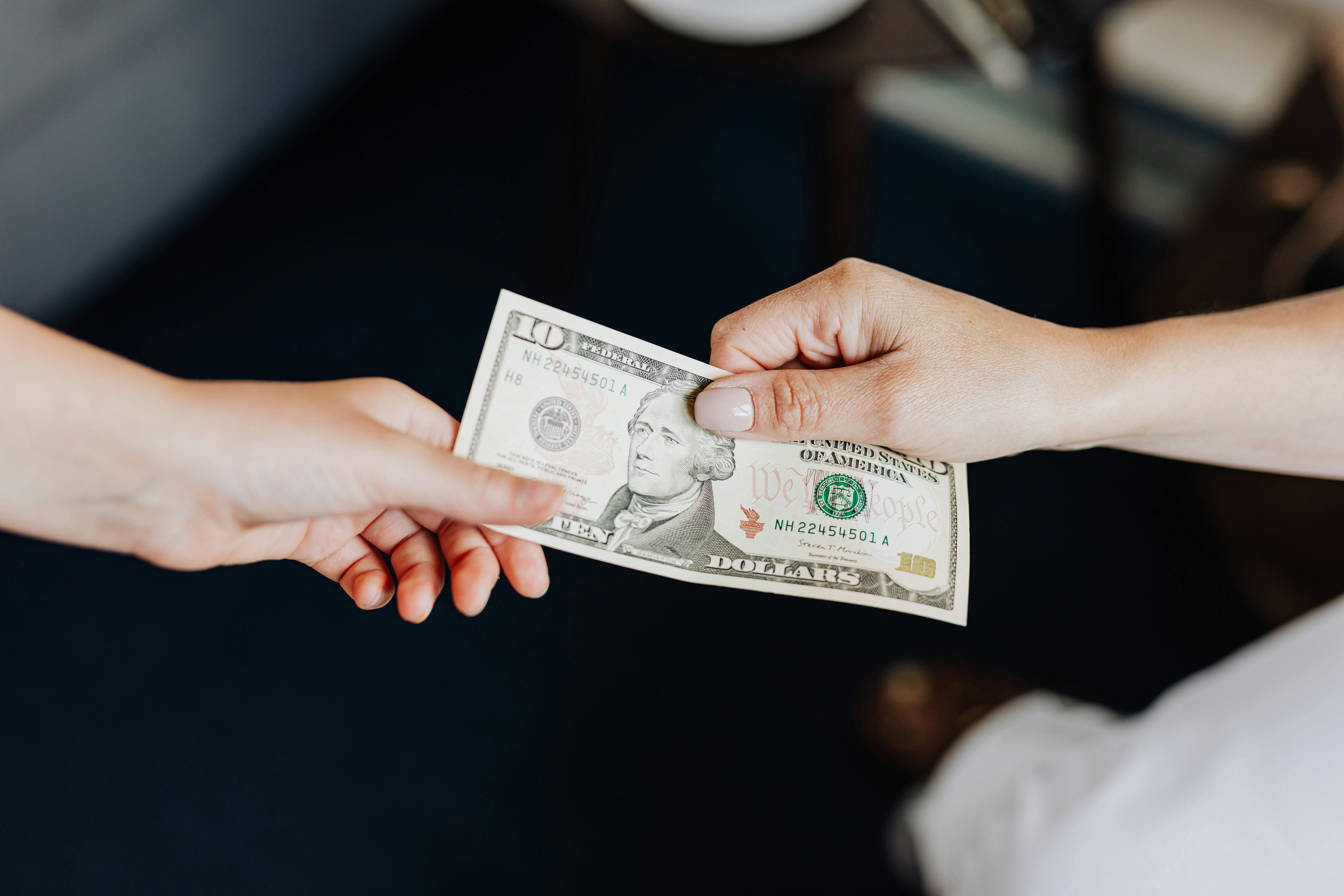 Giving money/picking off